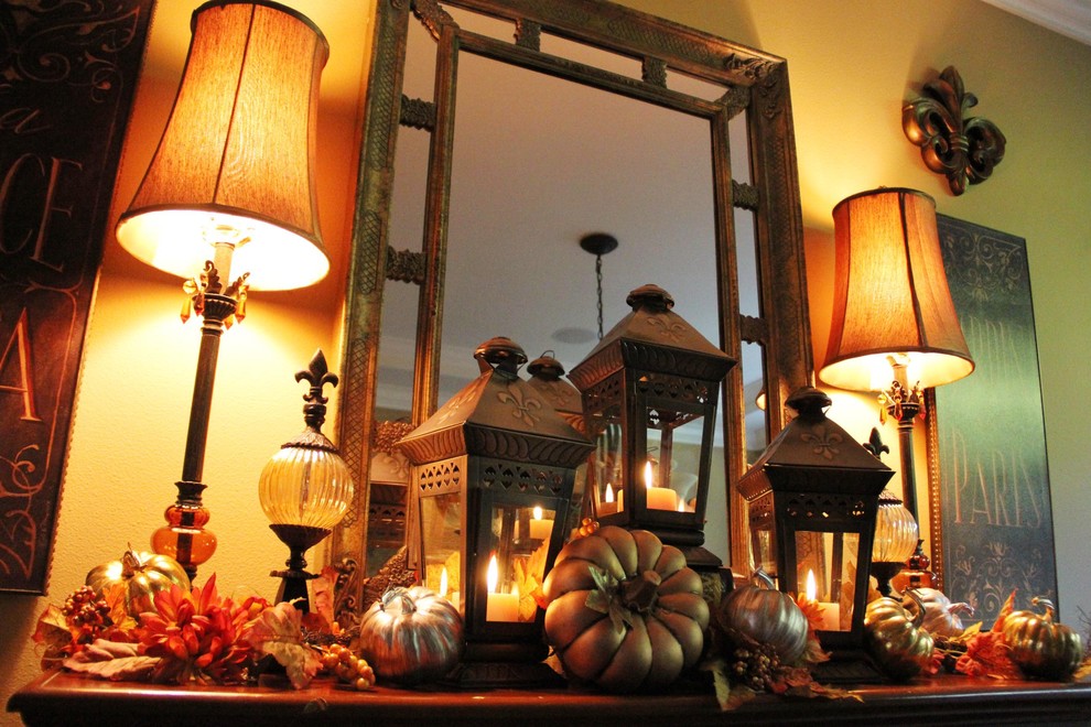 If you're searching for ideas to decorate your mantel for fall then think about lanterns. Here how cool it would look with a glow from candles in these lanterns.