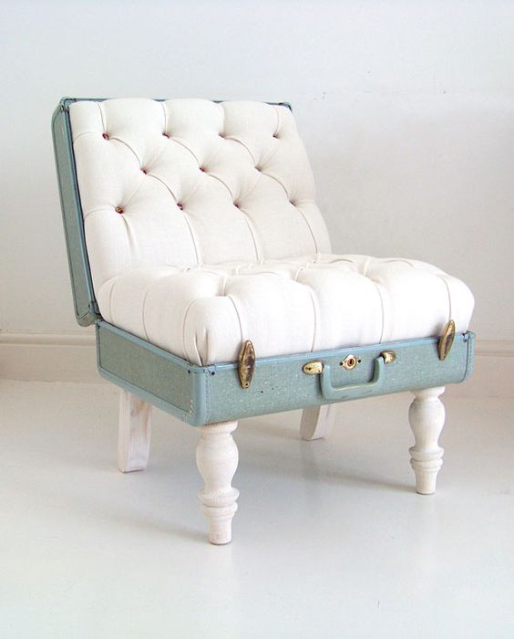 a catchy chair made of a vintage suitcase and creamy upholstery, with vintage legs is a whimsy idea for a vintage space