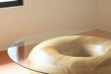 a creative coffee table with a glass table top