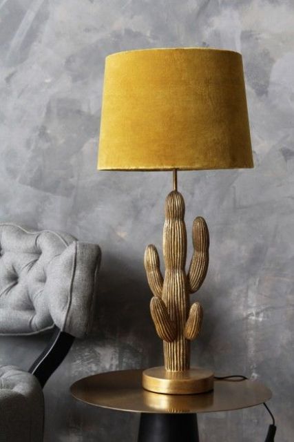 a gorgeous gold cactus table lamp with a mustard velvet lampshade is a bold sophisticated solution for a modern space