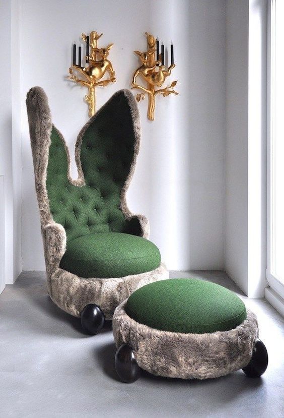 a green and grey faux fur chair reminding of a rabbit, with a matching ottoman is a super cool and fun idea