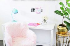 a light pink faux fur chair with brass legs is a great solution for a glam feminine home office