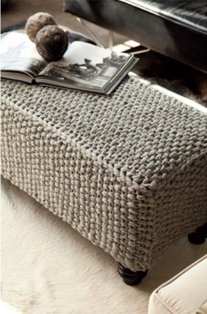a long grey knit ottoman with vintage legs is a cool piece to cozy up your room and make it welcoming