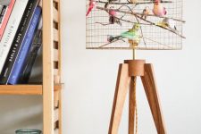 a quirky copper bird cage table lamp with lots of faux birds is a fun and cheerful idea for any space