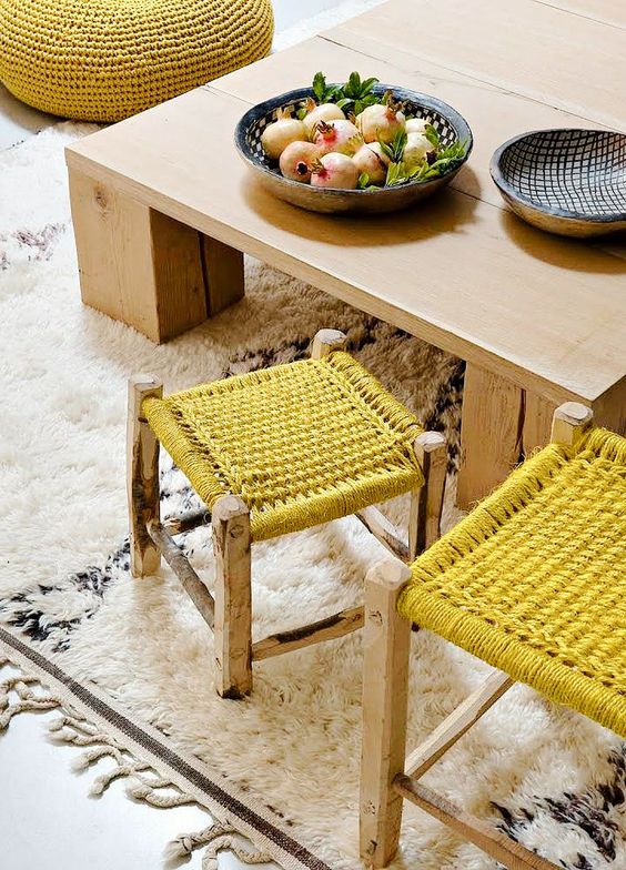 bright mustard crocheted stools and an ottoman are cool and comfy furniture pieces with plenty of color