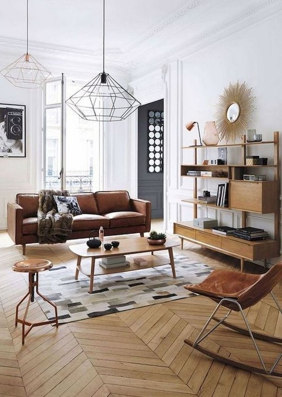 Geometric pendant lamps pefectly match the mid century modern style used here