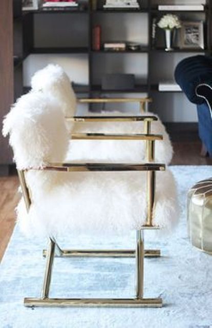 glam gold armchairs with white fur are chic and stylish and will add a shiny touch and a cozy feel to the space