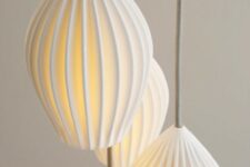 lamps are inspired by traditional Chinese lanterns and are handmade using British crafting techniques