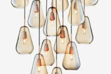 pendant lamps are inspired by the raindrops and harsh Scandinavian winters with just some sunlight