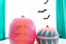 pink, orange and hot pink pumpkins with geometric stencils are a very bold and cool decoration