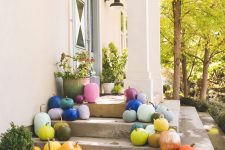 super colorful pumpkins placed on your porch will give it a fall feel and a colorful touch