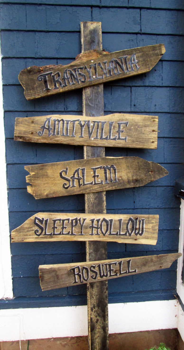 A rustic sign would show the most scary way for your guests.