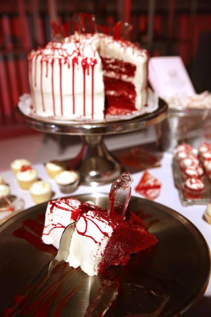 a bloody cake with blood dripping and lots of sugar shards with blood is an ideal solution for a Halloween party
