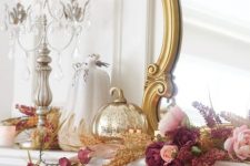 a gold mercury pumpkin, mauve and pink blooms and dried herbs will make your mantel very refined and Thanksgiving-like