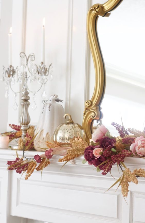 A gold mercury pumpkin, mauve and pink blooms and dried herbs will make your mantel very refined and Thanksgiving like