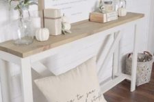 cozy white Thanksgiving decor with pumpkins, cotton and pale greenery is beautiful and chic