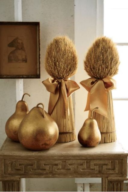 gilded pears, wheat bundles with gold bows for a chic and all-natural feel for Thanksgiving