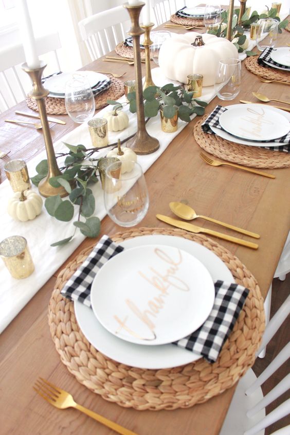 gold mercury glass candleholders, brass candleholders and gold cutlery for sprucing up the rustic tablescape
