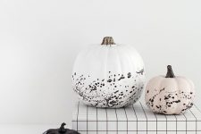 gorgeous minimalist Halloween pumpkins – a white, black and blush one with splatters are awesome