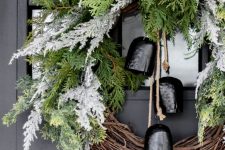 a simple and stylirsh rustic christmas wreath for a front door