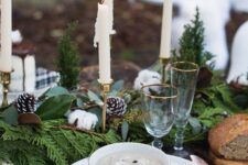 a cozy farmhouse chirstmas outdoor table setting