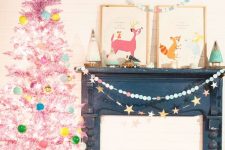 a pastel pink Christmas tree with aqua, green, yellow ornaments and lights is a dreamy and unusual idea for every space