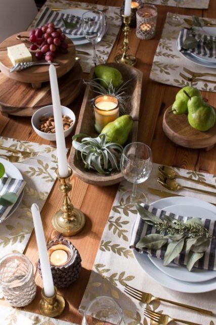 green pears, air plants and candles for creating a modern and chic Thanksgiving tablescape