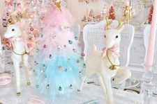 lovely pastel Christmas decor with an ombre Christmas tree with colorful ornaments, mini deer, a white Christmas tree with pastel ornaments