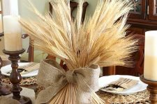 oversized acorns and wheat bundles with burlap bows are amazing for natural and rustic Thanksgiving tablescapes