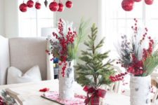 red ornaments, berries, evergreens, snowy Christmas wreaths and evergreens for natural holiday decor