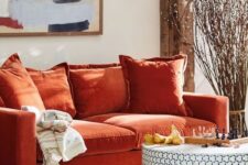 a cute orange sofa for a living room