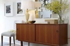 a classy rich-stained mid-century modern sideboard with two sliding doors on cone legs is a lovely idea for a modern space