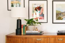 a rich-stained mid-century modern sideboard with drawers and doors and metal handles is a lovely idea to rock