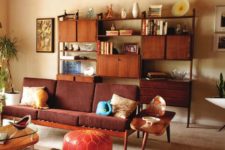 a rich stained storage unit with closed cabinets, shelves and drawers for a stylish mid-century modern interior