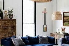 an elegant navy sofa in a stylish living room