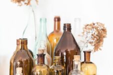 an arrangement of beautiful vintage bottles will add a bit of color and vintage feel to the space
