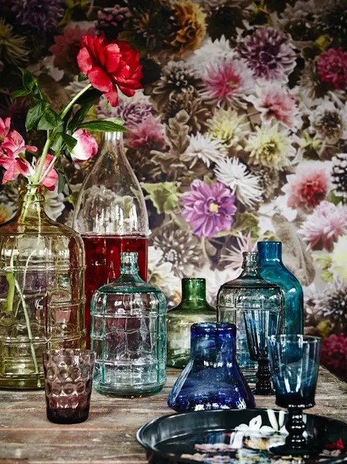 Colorful vintage bottles and vases with some bold peonies in them will give you bright summer like decor and a bold touch