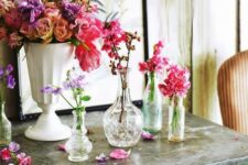 elegant and refined vintage crystal and porcelain bottles and vases with super bright blooms for summer home decor