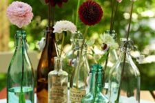 turquoise and green vintage bottles with and without labels will be a cool solution and a vase alternative