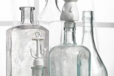 vintage pale blue bottles accented with fun lids are amazing for coastal home decor, create combos you like
