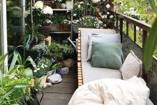 a lovely balcony with lots of greenery