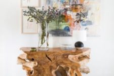 a driftwood console table that looks gorgeous