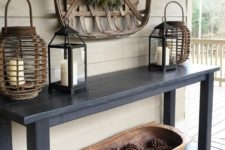a dough bowl fiilled with pinecones is a stylish idea for a rustic entryway