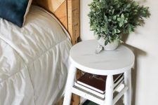 a white wooden stool with tiered shelves can be used as a small nightstand and you needn’t change anything to rock it