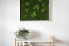 a framed moss wall art piece for a bright natural touch even outdoors
