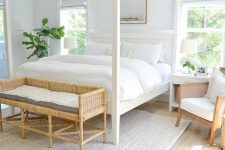 a stylish modern neutral bedroom with a white canopy bed, a woven bench, chairs and neutral textiles