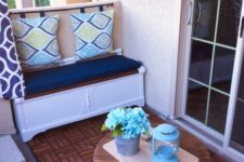 make a simple storage bench and go for a pillow back hanging the pillows on a stick or holder