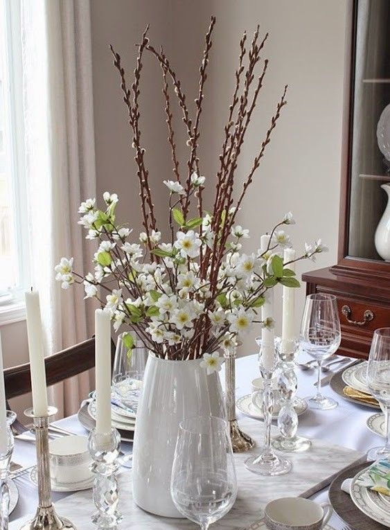a chic spring or Easter centerpiece of white flowering branches and pussy willow is easy to compose
