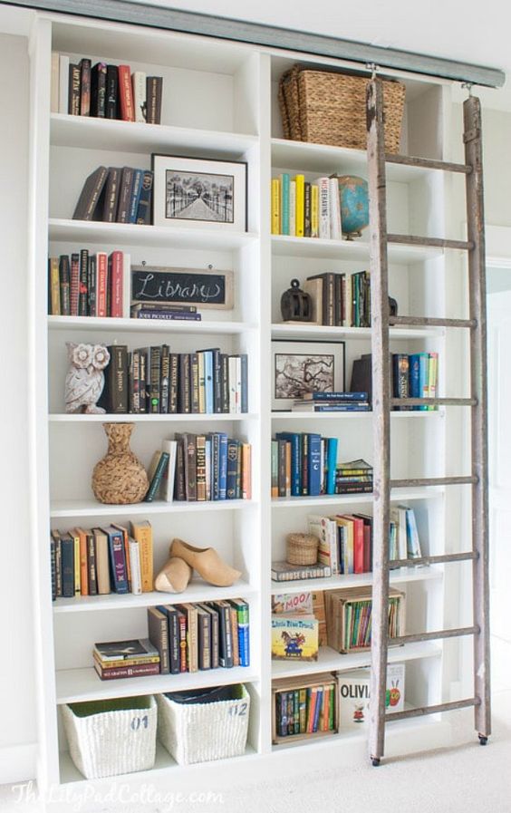 A custom IKEA bookshelf built in, with a ladder and some basket for storage is a veyr nice option to rock