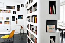 a gorgeous home library idea – lots of built-in bookshelves with black backing to make your books stand out